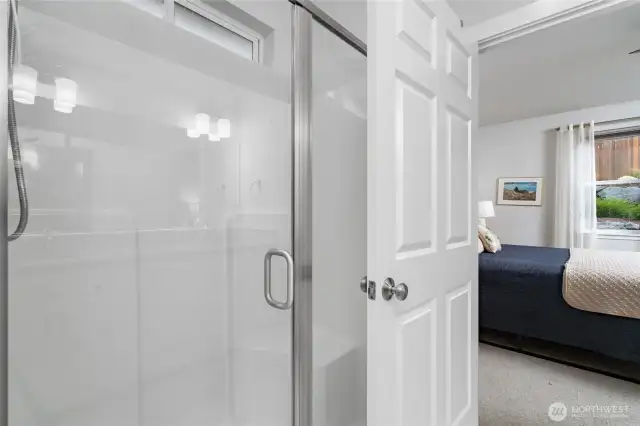 Walk in primary bathroom shower.