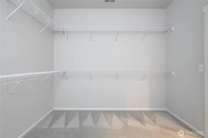 Extra large primary closet.