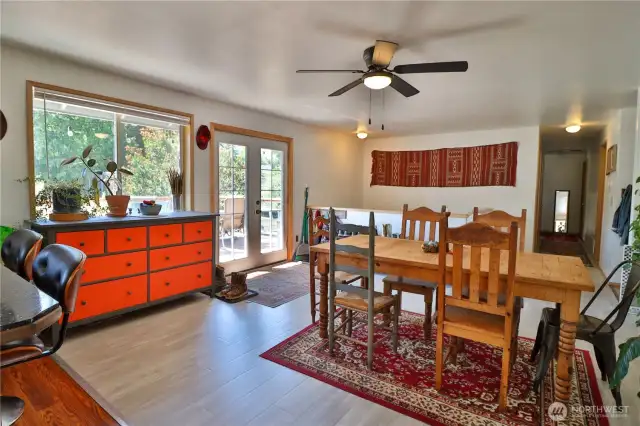 French doors lead out to the newer deck.