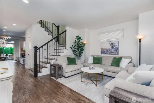 Cozy living room & open staircase
