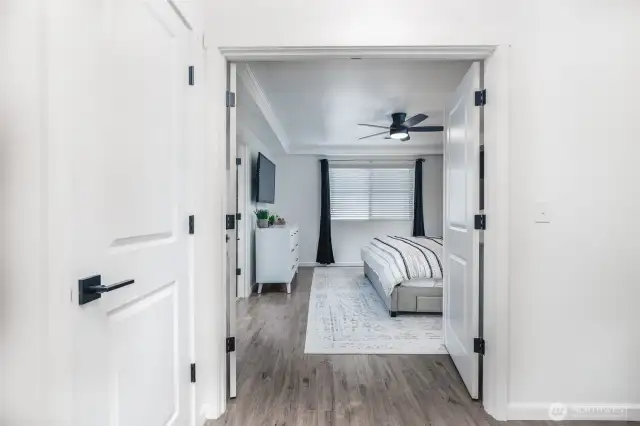 Primary suite entry through French doors