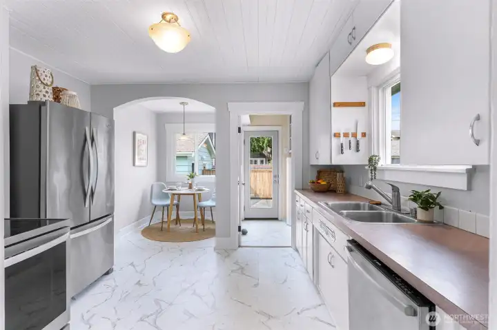 New Luxury Vinyl Plank kitchen flooring for years of sturdy use