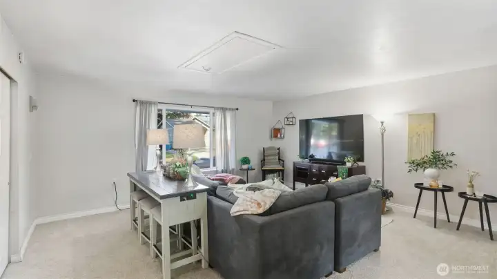 Spacious family room with sliding glass door to back patio.