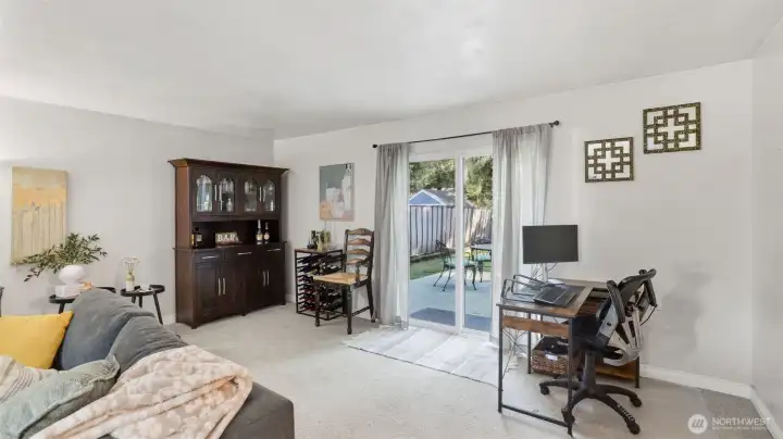 Spacious family room with sliding glass door to back patio.