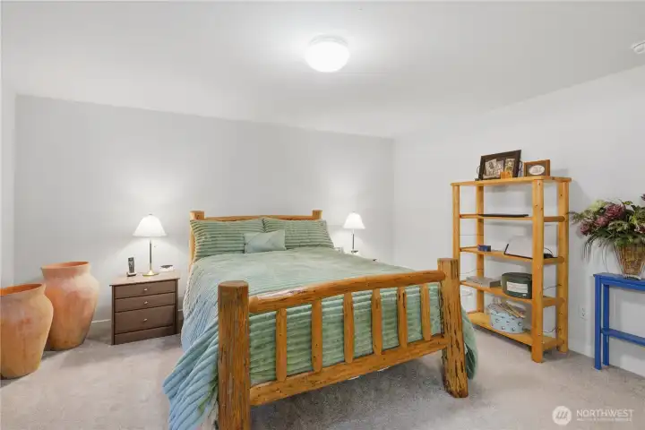 Generous primary suite with walk-in closet and private bath. Comfort and convenience all in one.