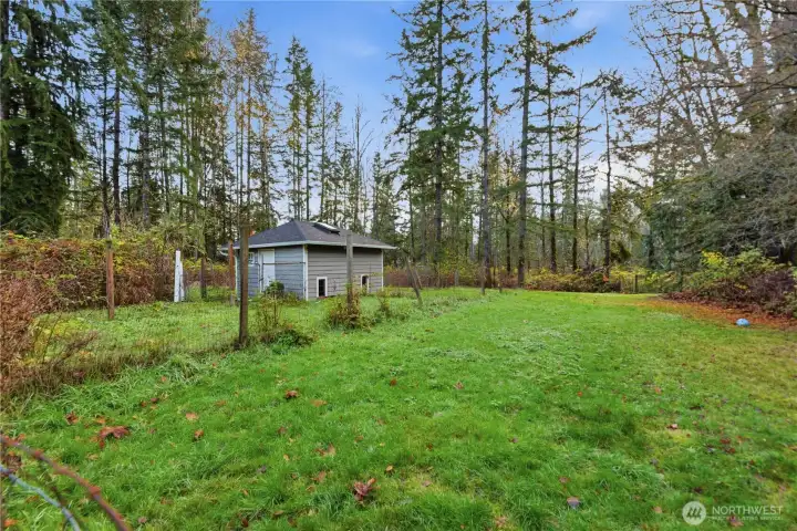 Large outbuilding that was used for a dog kennel, but you could certainly use it for anything you would like even extra storage.