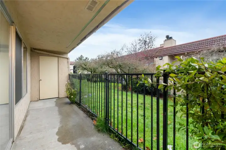 The closet offers added storage and the railing includes a gate for access to the fenced courtyard