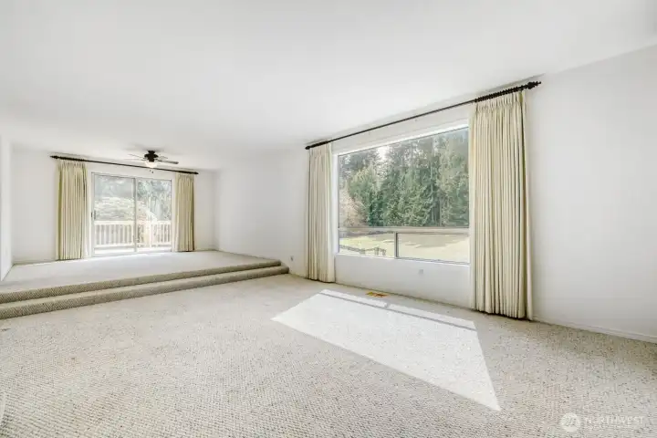 Sunken Living room with dining area
