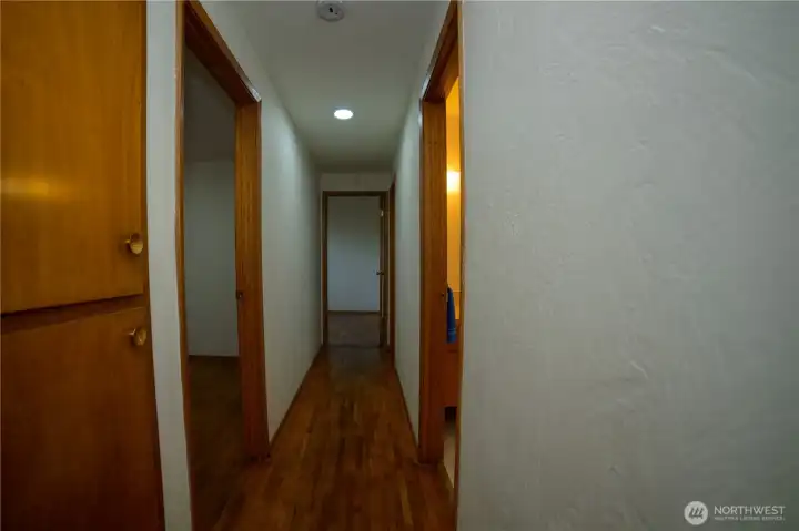 Hallway leading to the 3 bedrooms.