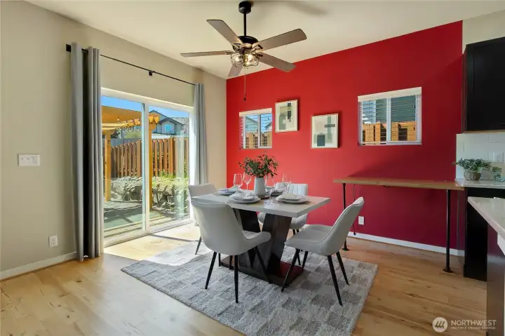 Dining space with access to the patio for summer grilling.
