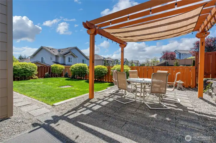 Perfect backyard with patio & gorgeous pergola.