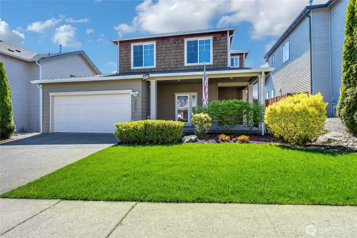 Nicely maintained yard & home.