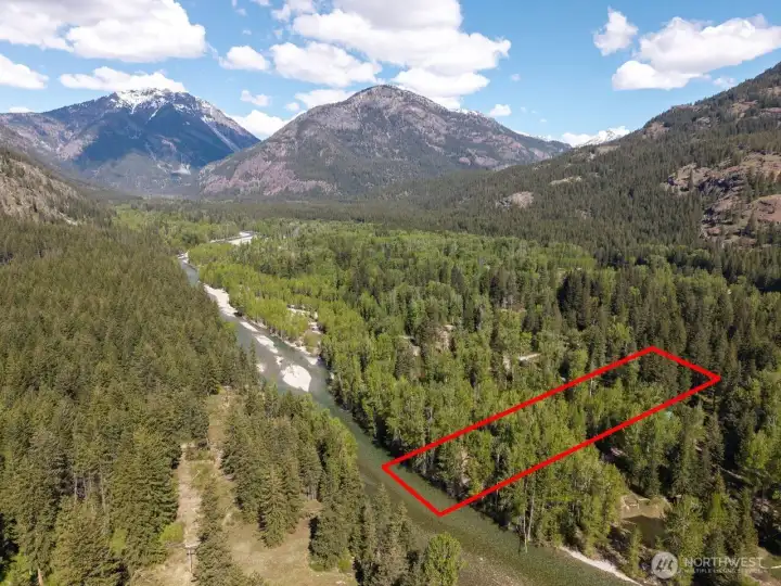 Exceptional 1.13 Acre lot on the Methow River. Well on-site.   Wired to pump in well.