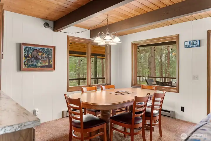Light wood features with rustic lodge accents like walnut stained beams.