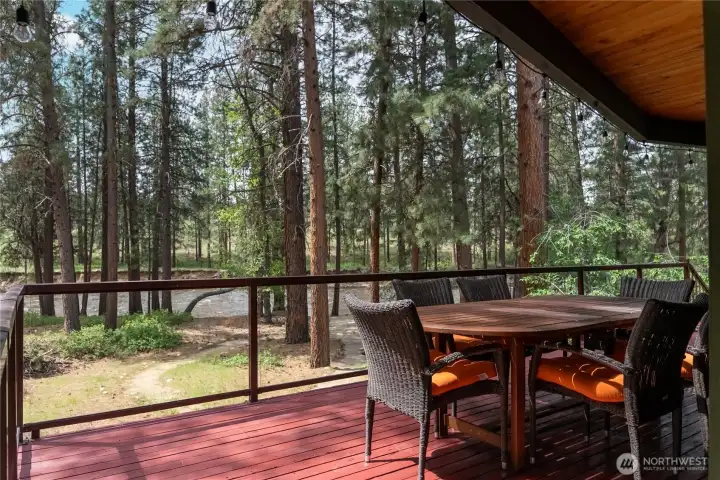 Main level wrap around deck with sliding glass doors for indoor/outdoor living.