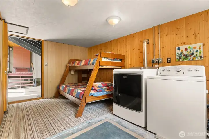 Quaint bunk house currently used as laundry room. Extra sleeping space.