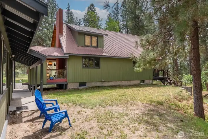 Cottage has small yard to the front and private patio space (not pictured) to the left for privacy.