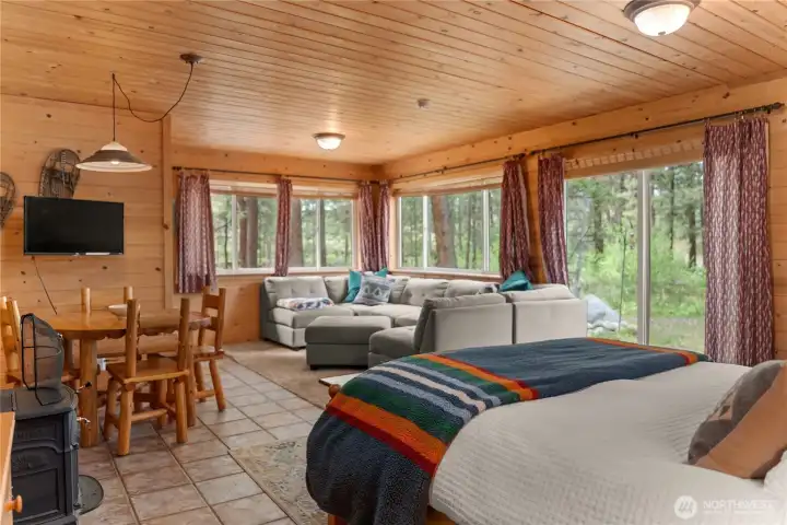 Dining space, sliding glass doors to private grill and hang area.