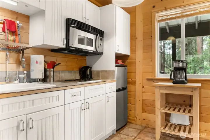 Cottage kitchen with bathroom just down the hall.