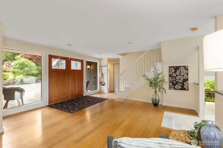 A look at the entry way, you can see the stairway and also the hallway access to the 2 bedrooms below.