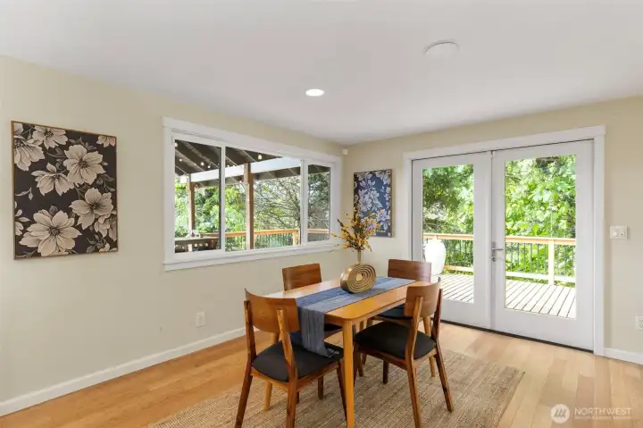 Dining room is just off the kitchen, and also has access to the right hand side of the grand deck