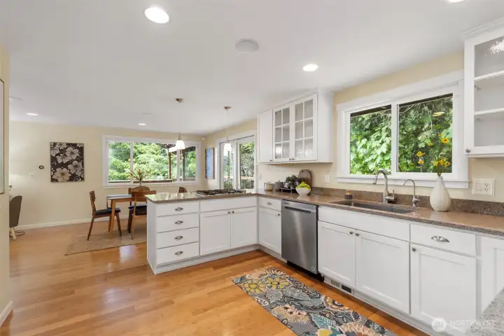 This kitchen has all the storage you need with granite countertops, and stainless steel appliances