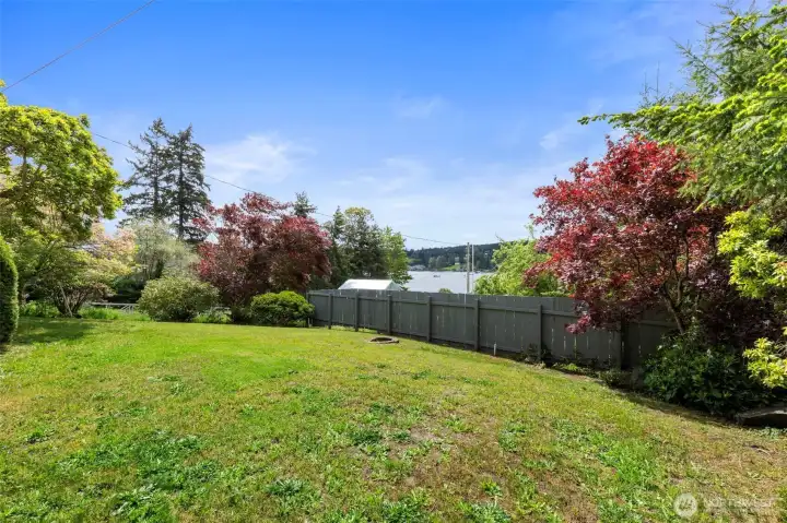 This is your private back yard, partially fenced and ready for you to soak up the sun rays