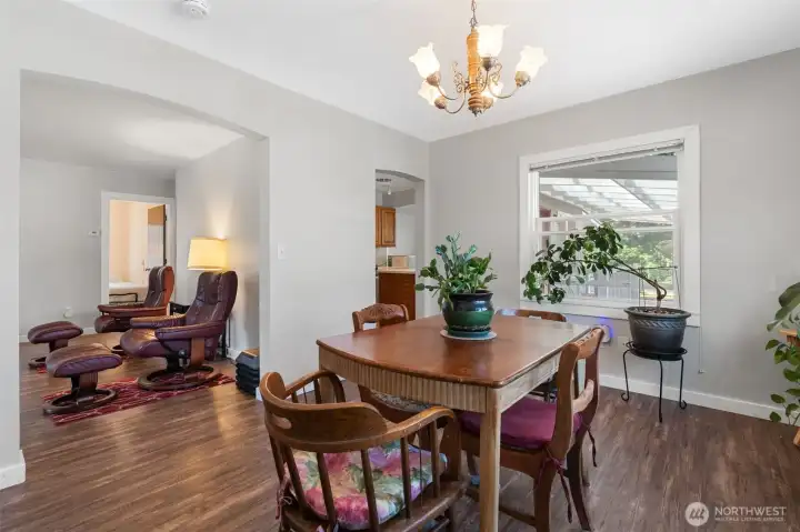 Dining room open to living room through this archway.