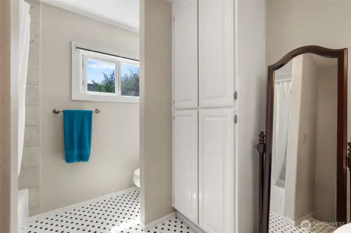 Lovely updated bathroom with ceramic tile flooring.