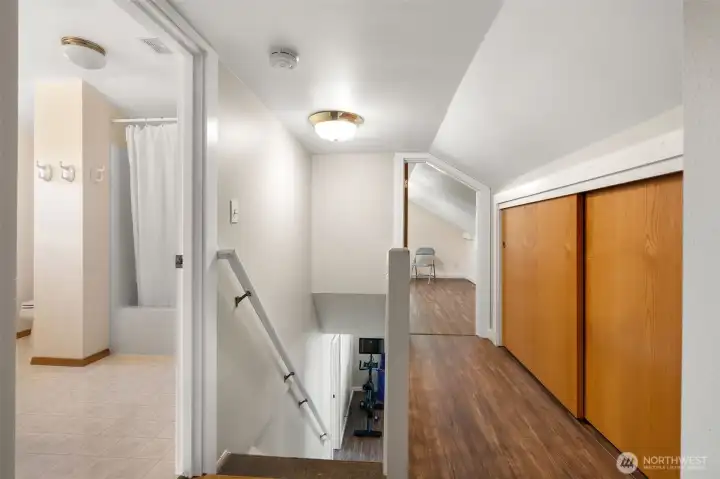 Second floor includes two bedrooms and a full bathroom.