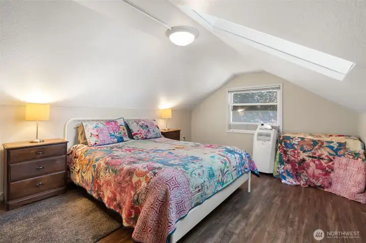Nice size bedroom facing front of the home.