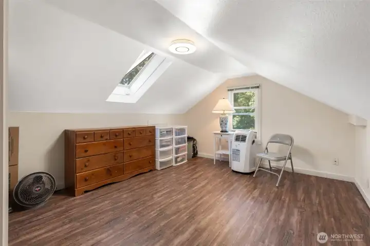Bedroom with window to back yard.