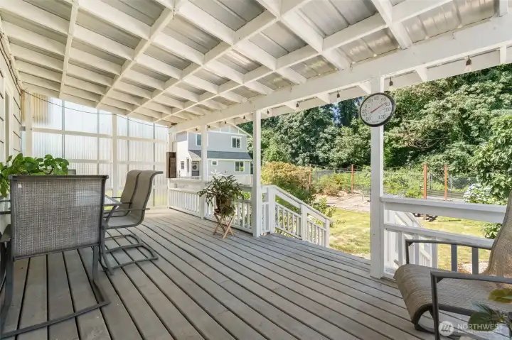 Wonderful covered deck to enjoy the backyard while remaining covered.