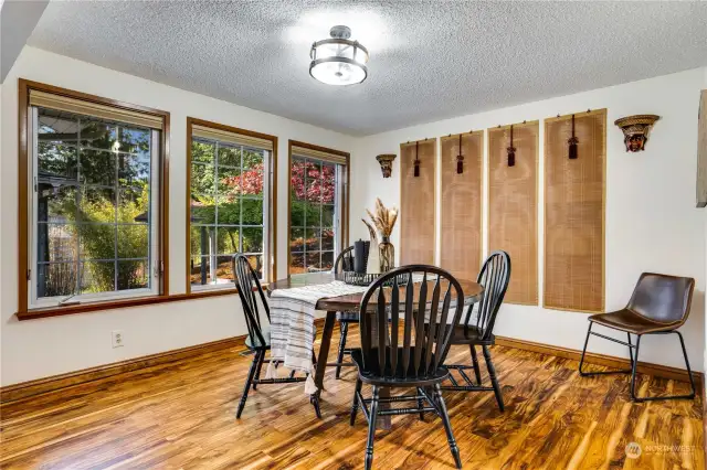 Formal dining space is open to the kitchen area and the large living room.