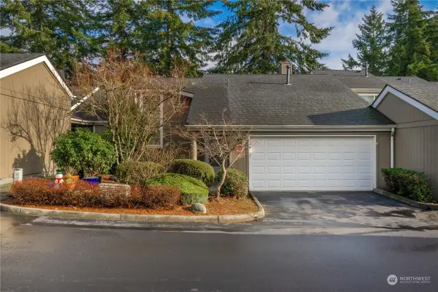 No stairs at your entry to this spacious townhome.