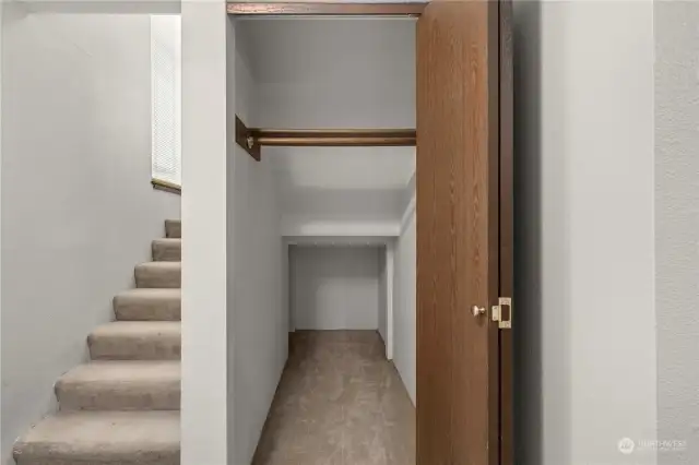 Under the staircase storage and coat closet at the entry is so useful.