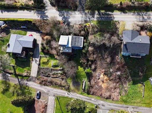 Park at the top or come down the paved driveway to see the property from the north side