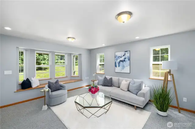 The room is bright and airy.  Don't miss the storage under the window seat.