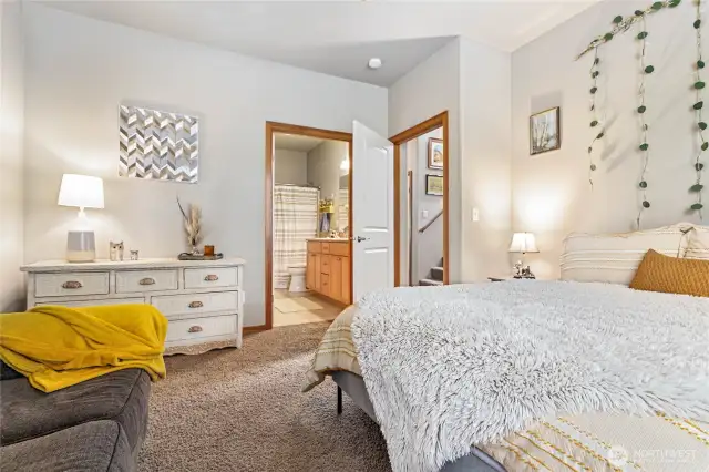 Main level primary suite with full bath and walk-in closet
