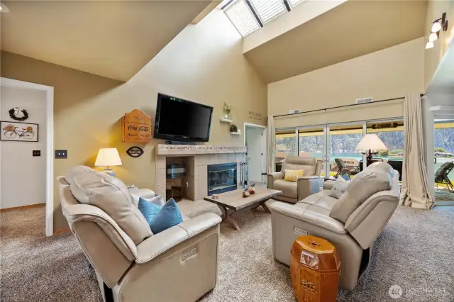 Vaulted living room with skylights