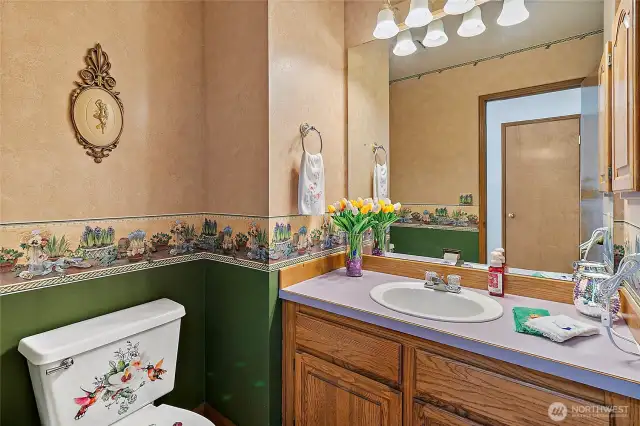 Half bath off Foyer.