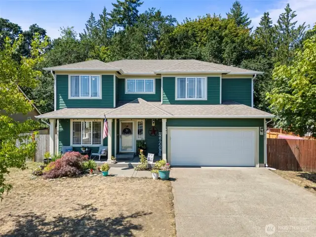 Two car attached garage plus driveway parking.
