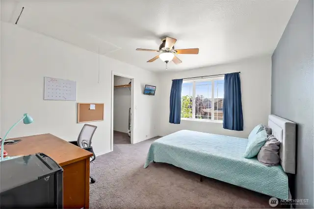 Third room includes large walk-in closet. Did you notice that all bedrooms have ceiling fans?