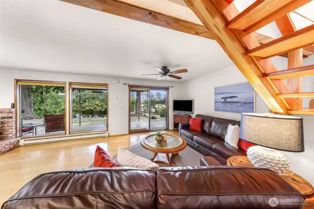 Cozy downstairs living room with natural light, enjoy the peaceful views.