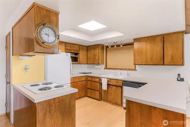 Functional kitchen with generous counter space.