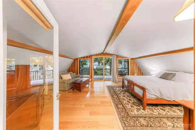 Primary suite with private balcony access.