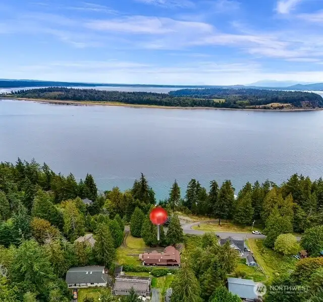 The street directly across the home connects directly to the clubhouse and boat launch.