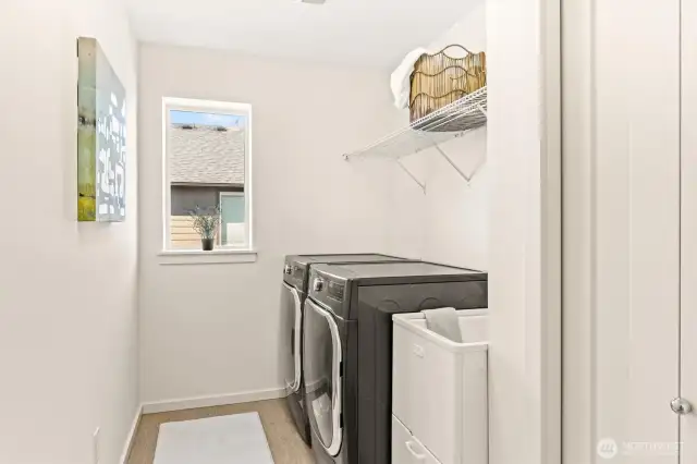 The conveniently located upstairs utility room.