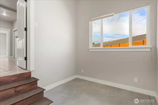 Office or Mudroom between garage and primary bed & bath