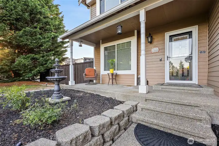 Covered patio with peaceful water feature to sit and enjoy the sounds and sights around.